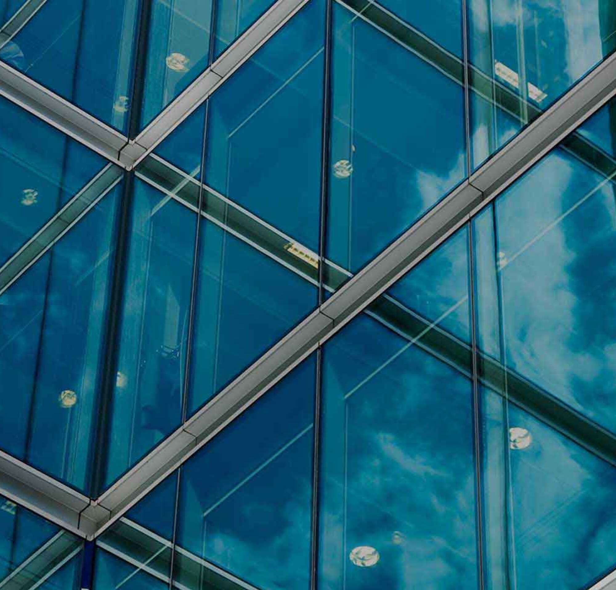 Glass windowed building with text introducing DocuSign products, integrations and APIs.